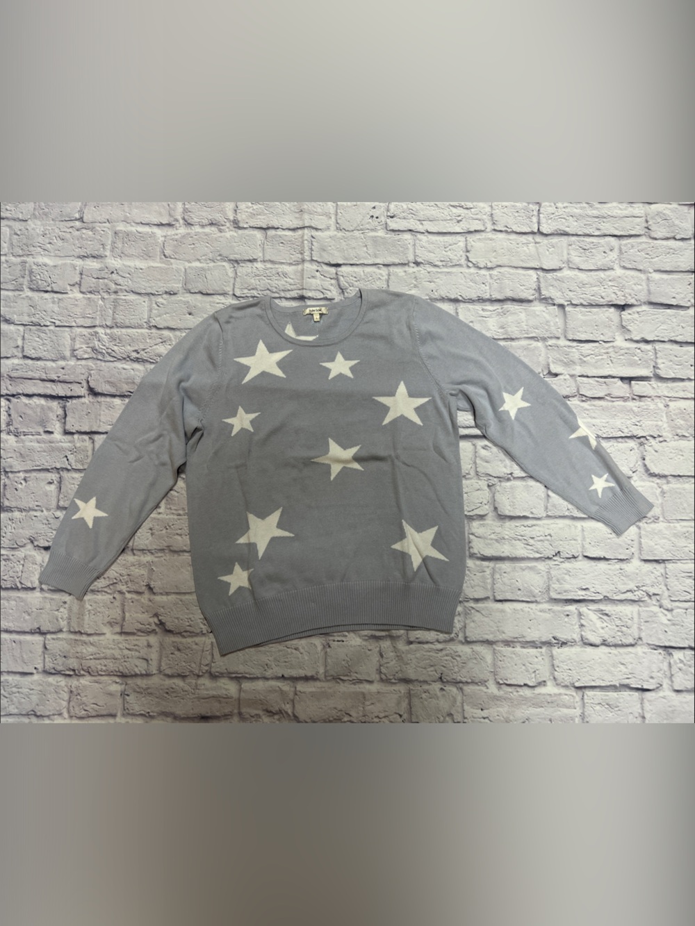 Tyler Boe Blue Sweater with White Star Pattern